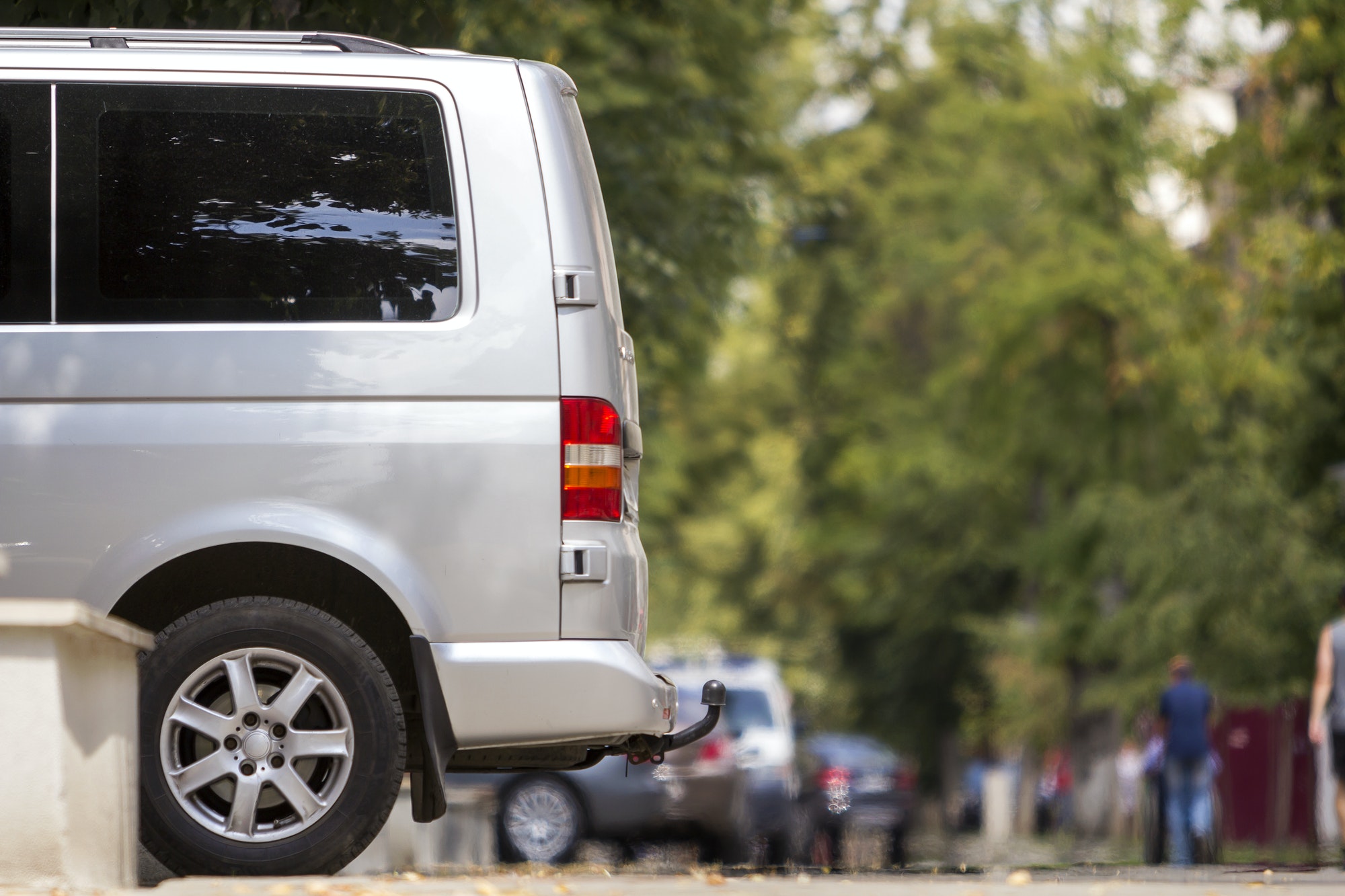 Tow Bar Installer- 10 Simple Steps to Follow Side view detail of white passenger medium size luxury minibus van