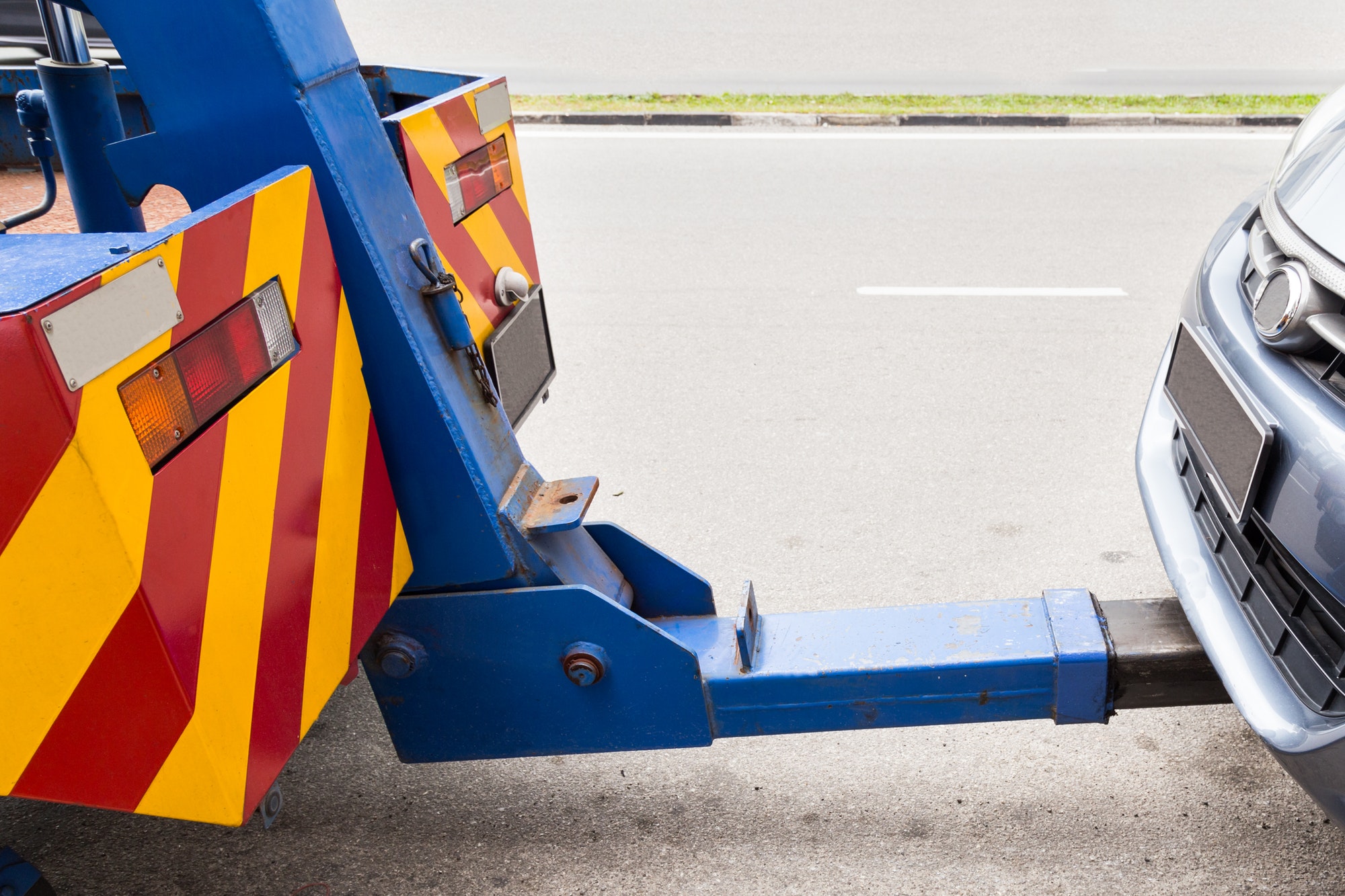 Broke Down without Breaking the Bank: Cheap Towing Services Near Me to the Rescue Tow truck towing a broken down car on the street