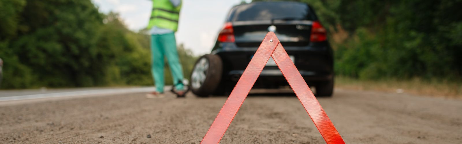Affordable Towing Solutions in Minneapolis: Your Guide to Cheap Towing Services Emergency stop sign, car breakdown, flat tyre